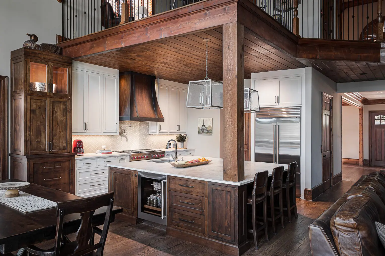 Luxury kitchen with custom wood cabinets and modern appliances by Michael James Remodeling.