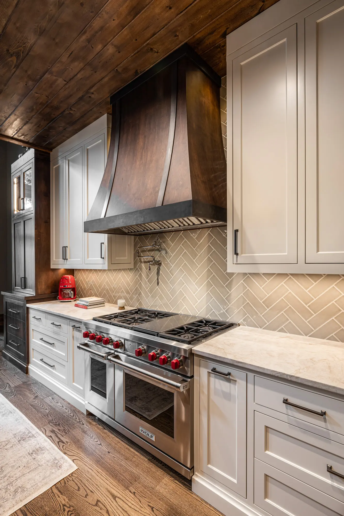 Luxury kitchen with custom wood cabinets and modern appliances
